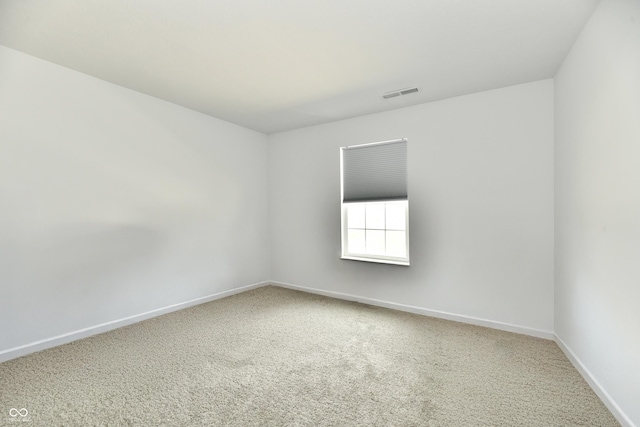 6883 Honeysuckle Way, Pendleton, IN 46064 - spare room featuring baseboards and carpet flooring