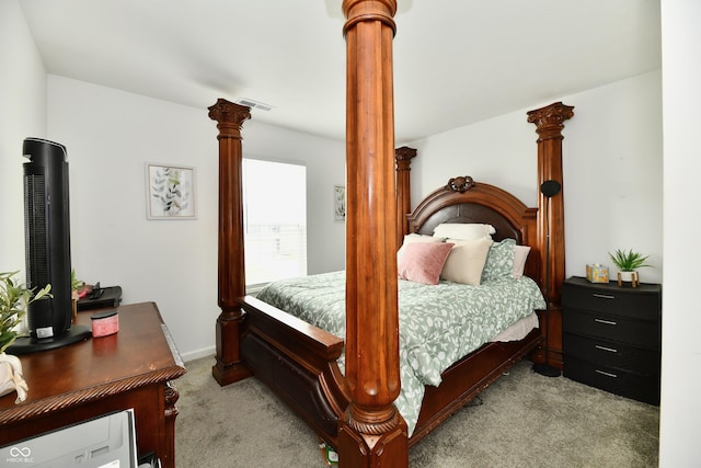 6883 Honeysuckle Way, Pendleton, IN 46064 - bedroom with light colored carpet and ornate columns