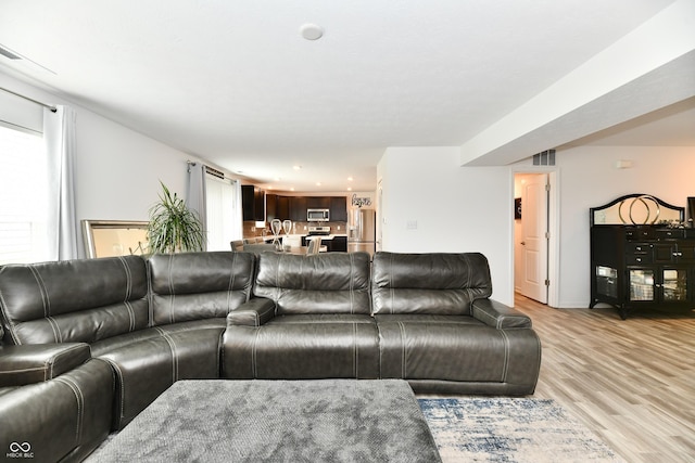 6883 Honeysuckle Way, Pendleton, IN 46064 - living room with light wood-style floors and recessed lighting