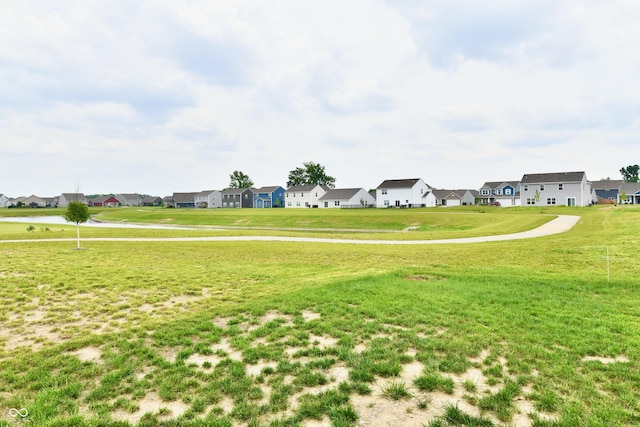 6883 Honeysuckle Way, Pendleton, IN 46064 - surrounding community featuring a residential view and a lawn