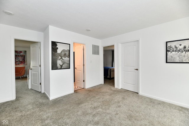 6883 Honeysuckle Way, Pendleton, IN 46064 - unfurnished bedroom featuring carpet floors and baseboards