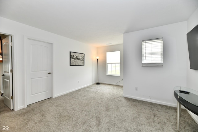 6883 Honeysuckle Way, Pendleton, IN 46064 - spare room with carpet floors and baseboards