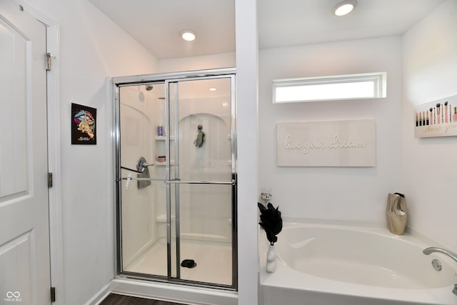 6883 Honeysuckle Way, Pendleton, IN 46064 - full bath featuring a shower stall, a bath, and recessed lighting