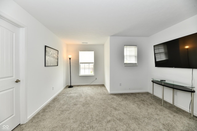 6883 Honeysuckle Way, Pendleton, IN 46064 - unfurnished living room with carpet and baseboards