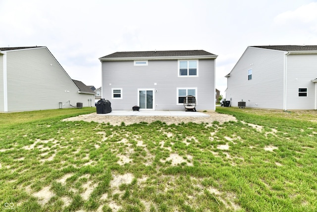 6883 Honeysuckle Way, Pendleton, IN 46064 - rear view of property featuring a patio area, a yard, and central AC unit