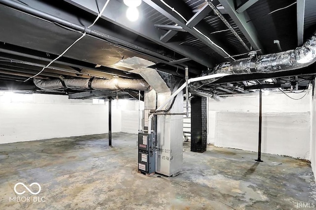 701 E Memorial Dr, Muncie, IN 47302 - below grade area featuring heating unit