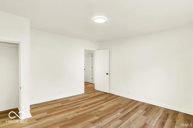 701 E Memorial Dr, Muncie, IN 47302 - unfurnished room featuring light wood finished floors and baseboards