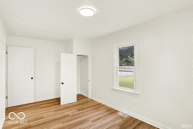 701 E Memorial Dr, Muncie, IN 47302 - unfurnished bedroom featuring light wood finished floors and baseboards