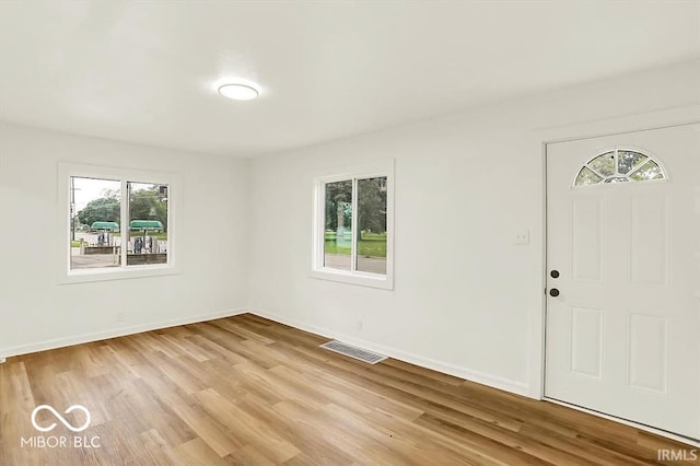 701 E Memorial Dr, Muncie, IN 47302 - foyer with light wood-type flooring and baseboards
