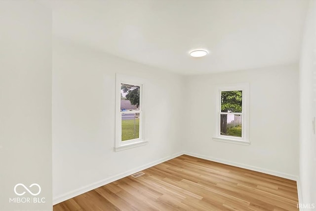 701 E Memorial Dr, Muncie, IN 47302 - spare room featuring light wood finished floors and baseboards