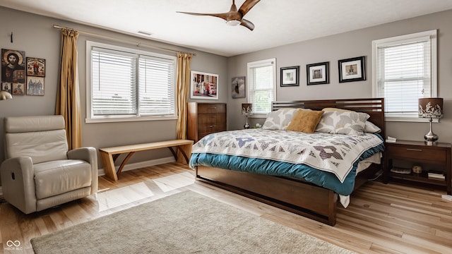2020 N Park Ave, Indianapolis, IN 46202 - bedroom featuring wood finished floors, a ceiling fan, and baseboards