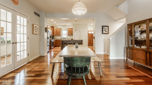 2020 N Park Ave, Indianapolis, IN 46202 - dining area featuring dark wood-type flooring and baseboards
