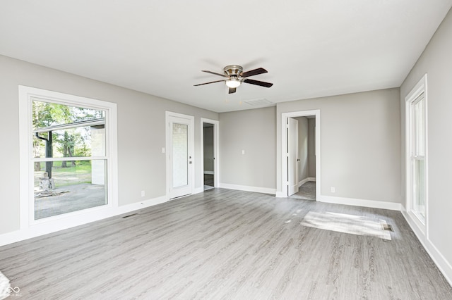 496 N County Road 325 W, Danville, IN 46122 - spare room with wood finished floors and ceiling fan