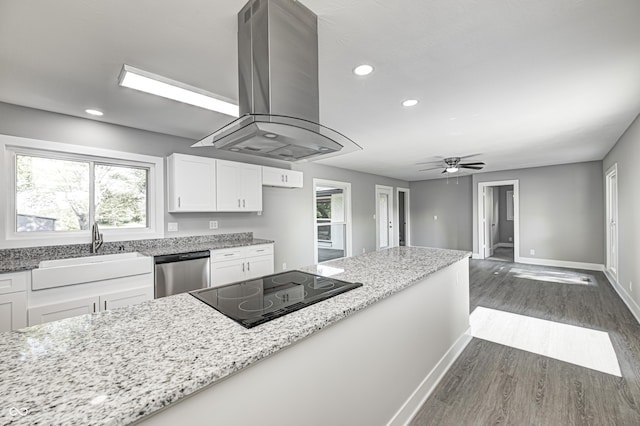 496 N County Road 325 W, Danville, IN 46122 - kitchen featuring island exhaust hood, dishwasher, black electric cooktop, white cabinets, and light stone countertops