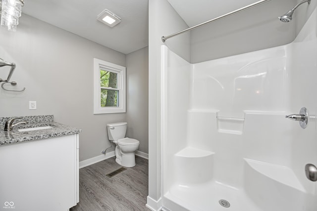 496 N County Road 325 W, Danville, IN 46122 - bathroom with wood finished floors, vanity, and a shower