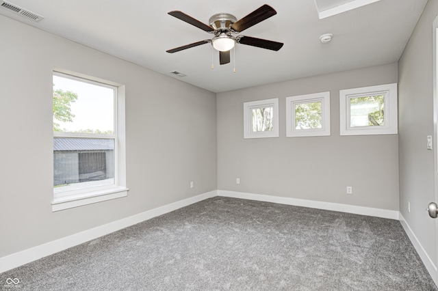 496 N County Road 325 W, Danville, IN 46122 - empty room featuring dark colored carpet, ceiling fan, and a smoke detector