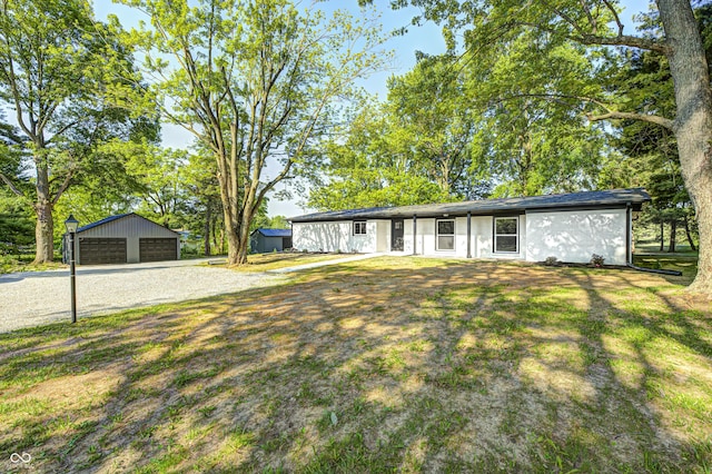 496 N County Road 325 W, Danville, IN 46122 - view of front of home with an outdoor structure, a garage, driveway, and a front yard