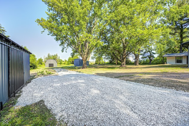 496 N County Road 325 W, Danville, IN 46122 - view of yard featuring a storage shed and gravel driveway