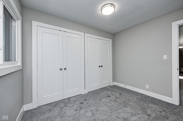 496 N County Road 325 W, Danville, IN 46122 - unfurnished bedroom with carpet and multiple closets