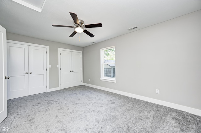 496 N County Road 325 W, Danville, IN 46122 - unfurnished bedroom with carpet flooring, multiple closets, and a ceiling fan