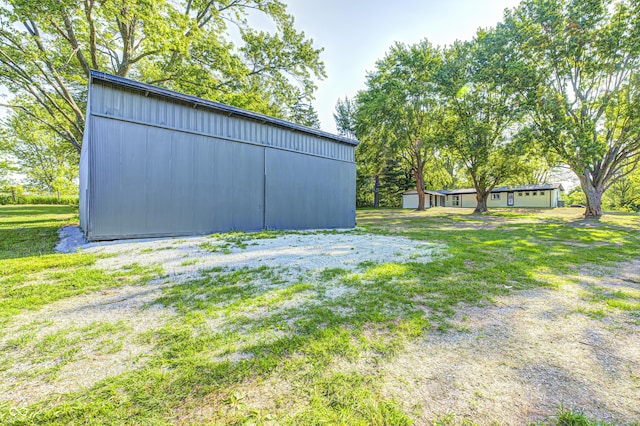 496 N County Road 325 W, Danville, IN 46122 - view of grassy yard with an outdoor structure and an outbuilding