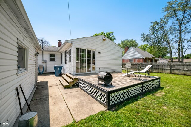 120 Hoss Rd, Indianapolis, IN 46217 - rear view of house featuring a deck and a chimney