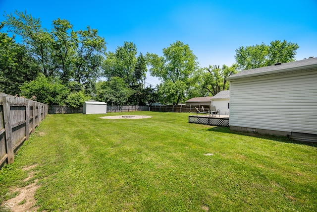 120 Hoss Rd, Indianapolis, IN 46217 - view of yard featuring a fire pit and a deck