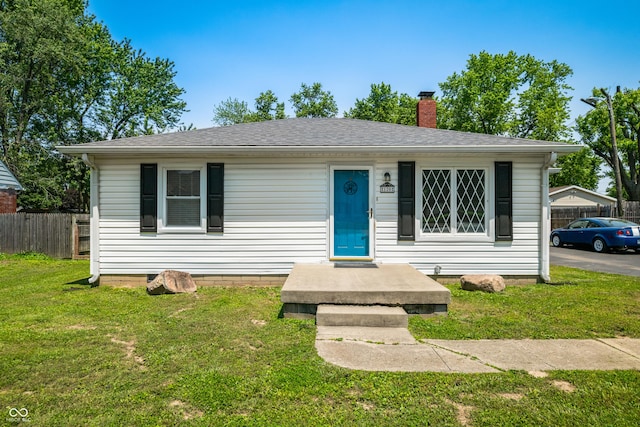 120 Hoss Rd, Indianapolis, IN 46217 - view of front of house with a chimney and a shingled roof