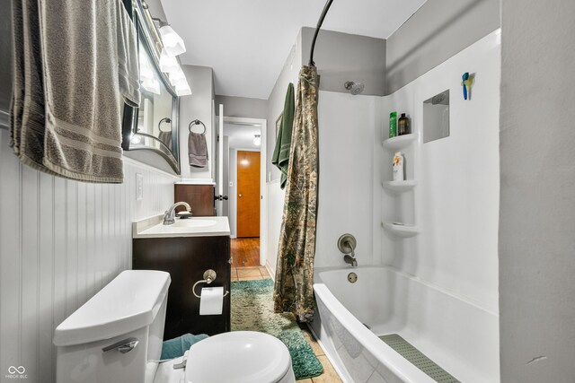 120 Hoss Rd, Indianapolis, IN 46217 - full bath with toilet, vanity, shower / bathtub combination with curtain, and tile patterned flooring