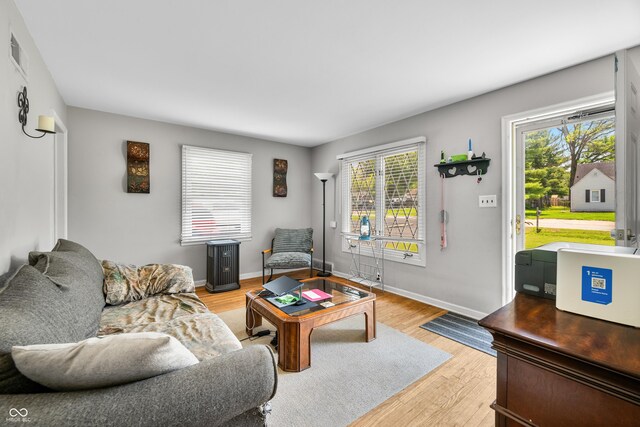 120 Hoss Rd, Indianapolis, IN 46217 - living area with light wood-style flooring and baseboards