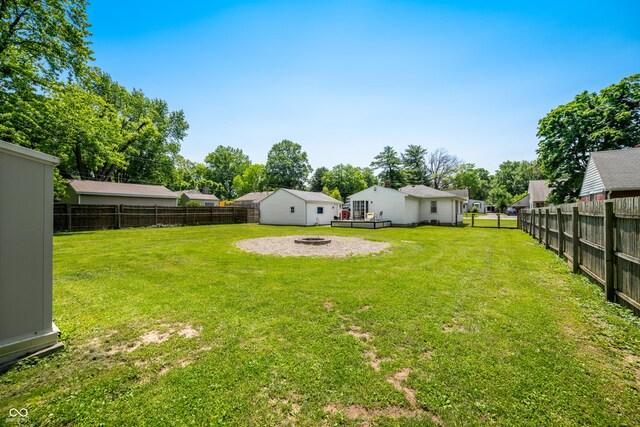 120 Hoss Rd, Indianapolis, IN 46217 - view of yard featuring an outdoor fire pit