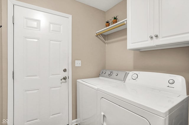1056 Hilltop Commons Blvd, Whiteland, IN 46184 - washroom with washing machine and clothes dryer and cabinet space