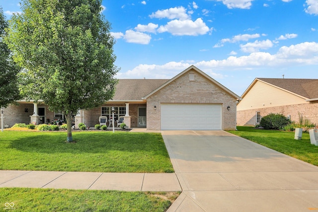 1056 Hilltop Commons Blvd, Whiteland, IN 46184 - ranch-style home with brick siding, a garage, a front lawn, and concrete driveway