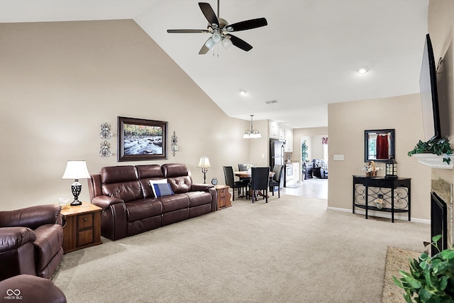 1056 Hilltop Commons Blvd, Whiteland, IN 46184 - living area with light colored carpet, high vaulted ceiling, a ceiling fan, a fireplace, and baseboards