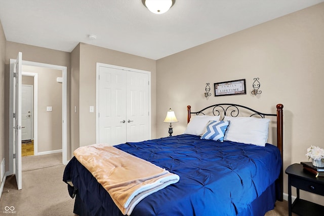 1056 Hilltop Commons Blvd, Whiteland, IN 46184 - bedroom featuring light carpet, a closet, and baseboards