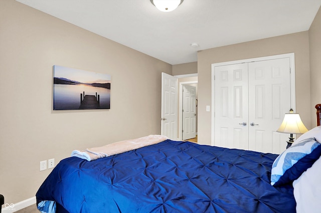 1056 Hilltop Commons Blvd, Whiteland, IN 46184 - carpeted bedroom with a closet and baseboards
