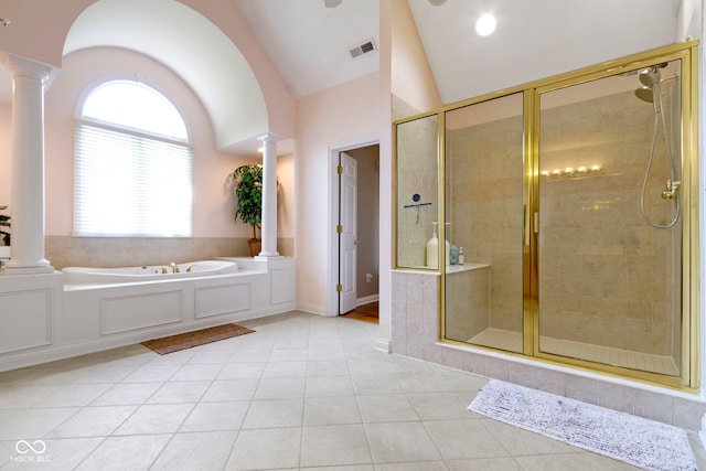 4763 Woods Edge Dr, Zionsville, IN 46077 - bathroom with ornate columns, lofted ceiling, a bath, tile patterned flooring, and a shower stall