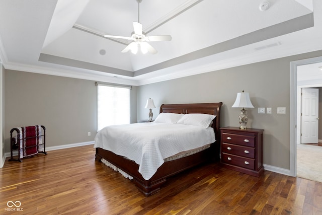 4763 Woods Edge Dr, Zionsville, IN 46077 - bedroom with a raised ceiling, wood finished floors, ceiling fan, and crown molding