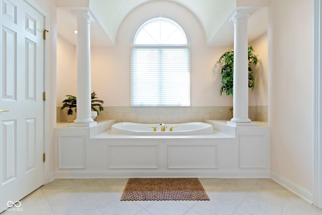 4763 Woods Edge Dr, Zionsville, IN 46077 - full bath featuring ornate columns, a garden tub, and tile patterned flooring