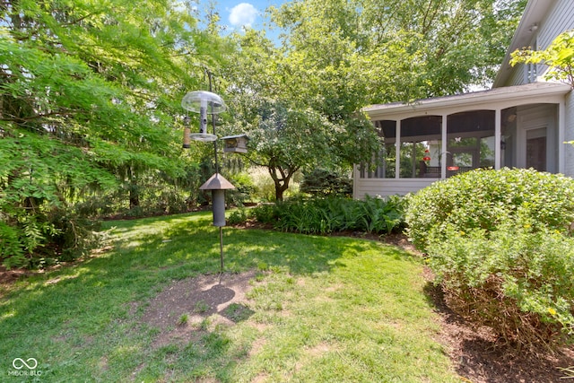 4763 Woods Edge Dr, Zionsville, IN 46077 - view of grassy yard featuring a sunroom