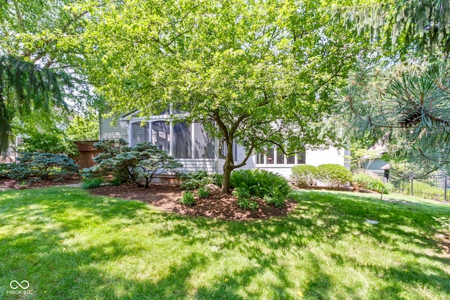 4763 Woods Edge Dr, Zionsville, IN 46077 - view of yard featuring a sunroom