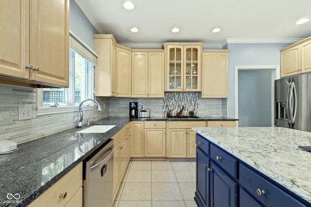 4763 Woods Edge Dr, Zionsville, IN 46077 - kitchen with appliances with stainless steel finishes, light brown cabinetry, crown molding, light tile patterned floors, and glass insert cabinets