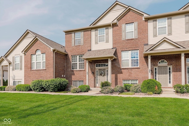 8425 Codesa Way, Indianapolis, IN 46278 - view of property with a front yard and brick siding