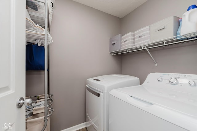 8425 Codesa Way, Indianapolis, IN 46278 - washroom with washing machine and dryer