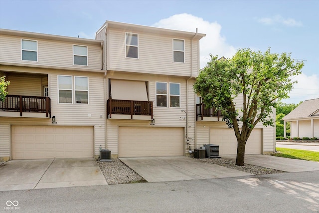 8425 Codesa Way, Indianapolis, IN 46278 - townhome / multi-family property with central AC, a garage, and driveway