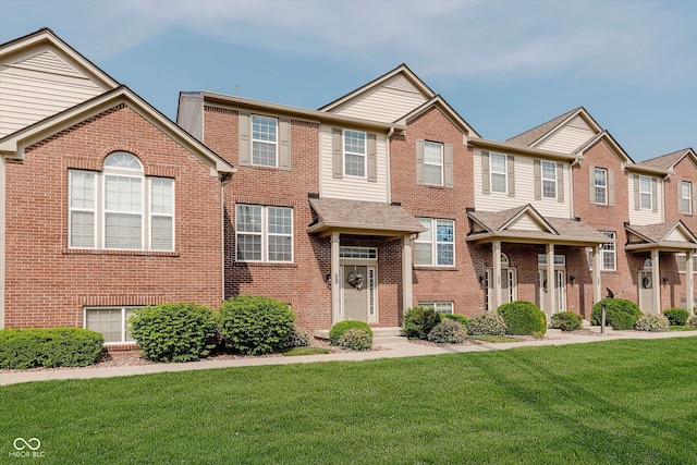 8425 Codesa Way, Indianapolis, IN 46278 - view of front of house featuring brick siding and a front yard