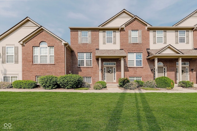 8425 Codesa Way, Indianapolis, IN 46278 - view of front facade featuring a front yard and brick siding