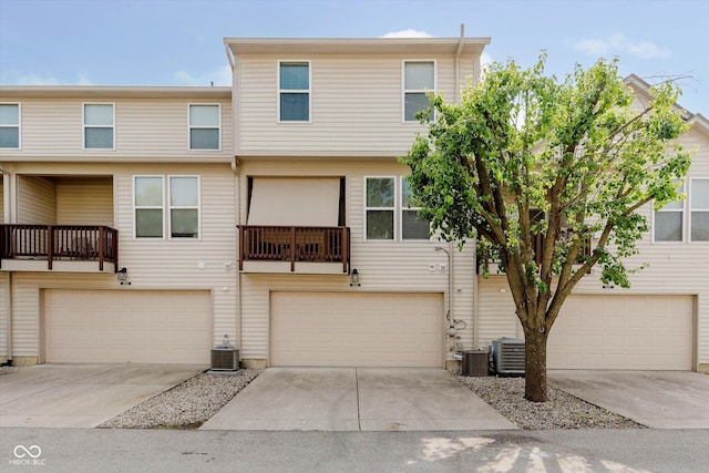 8425 Codesa Way, Indianapolis, IN 46278 - multi unit property featuring an attached garage and central air condition unit