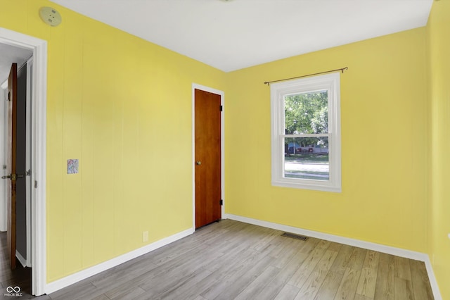 11 14th St, Franklin, IN 46131 - unfurnished room featuring wood finished floors, baseboards, and a smoke detector