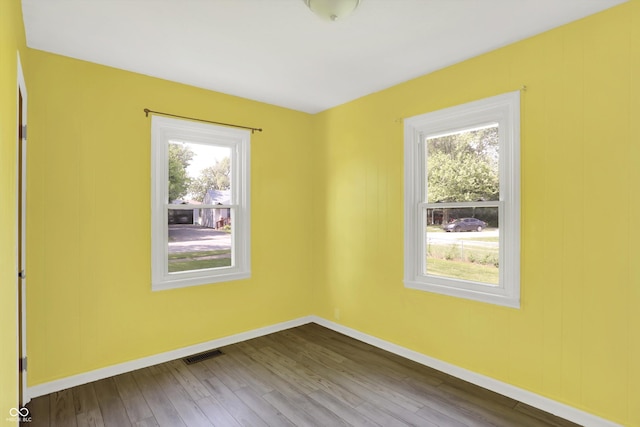 11 14th St, Franklin, IN 46131 - unfurnished room featuring healthy amount of natural light, wood finished floors, and baseboards